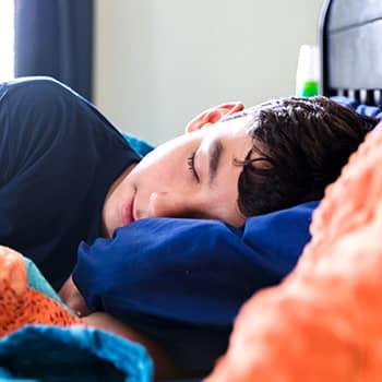 Teenage boy sleeping